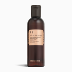 Brown bottle with a  rose gold label for The Body Shop SPA OF THE WORLD product titled Polynesian monoi radiance oil