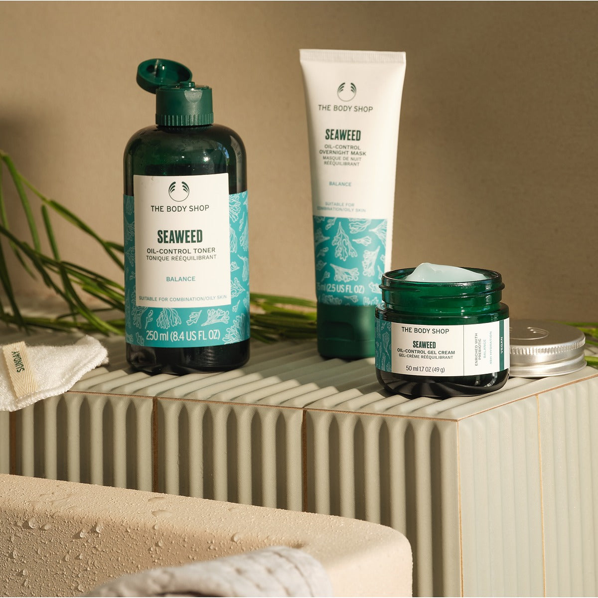 The Body Shop seaweed skincare products on a neutral background