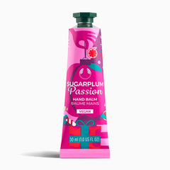 Pink tube of Sugarplum Passion hand balm on a white background