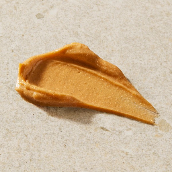 Swatch of a orange beige vitamin c scrub