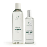 Two bottles of The Body Shop White Musk products on a white background