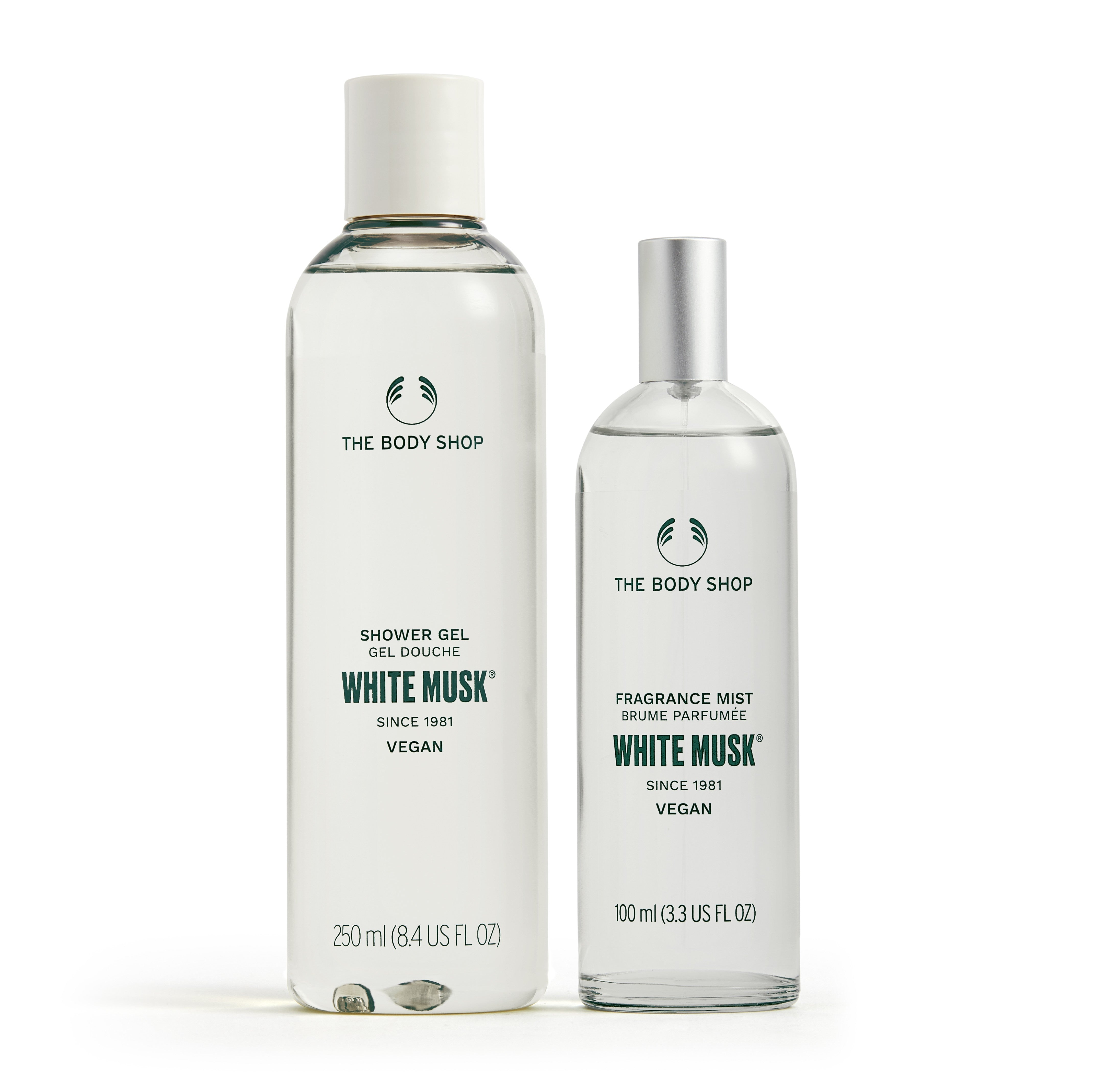 Two bottles of The Body Shop White Musk products on a white background