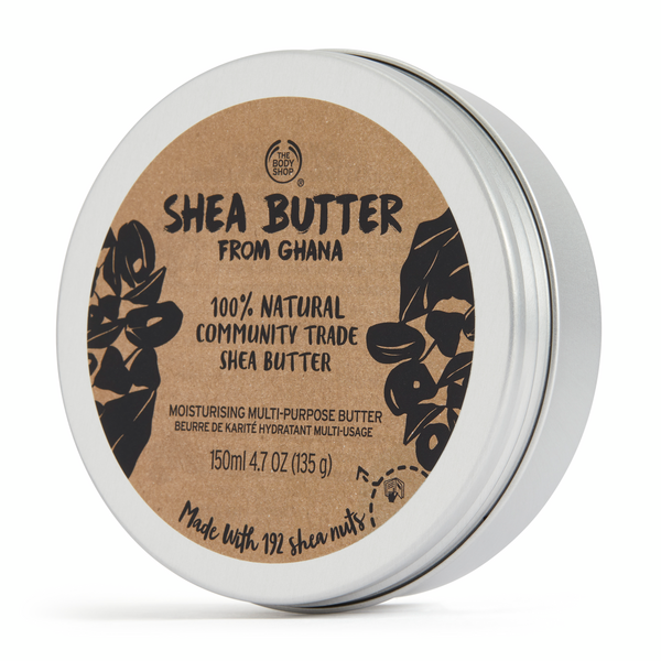 Shea butter container with brown label and silver lid on a white background