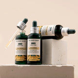 The Body Shop Ginger Scalp Care products on a neutral background