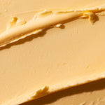 Close-up of a spreadable yellow cream or butter