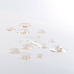 Swatch of liquid serum on a white background