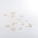 Swatch of liquid serum on a white background