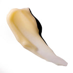 Swatch of a orange beige colour cream on a white backround